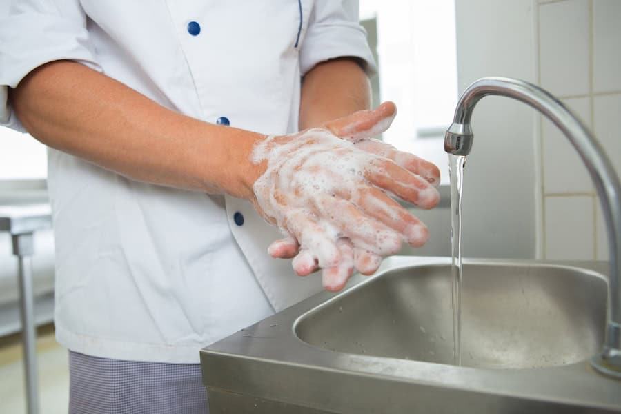 cook washing hands